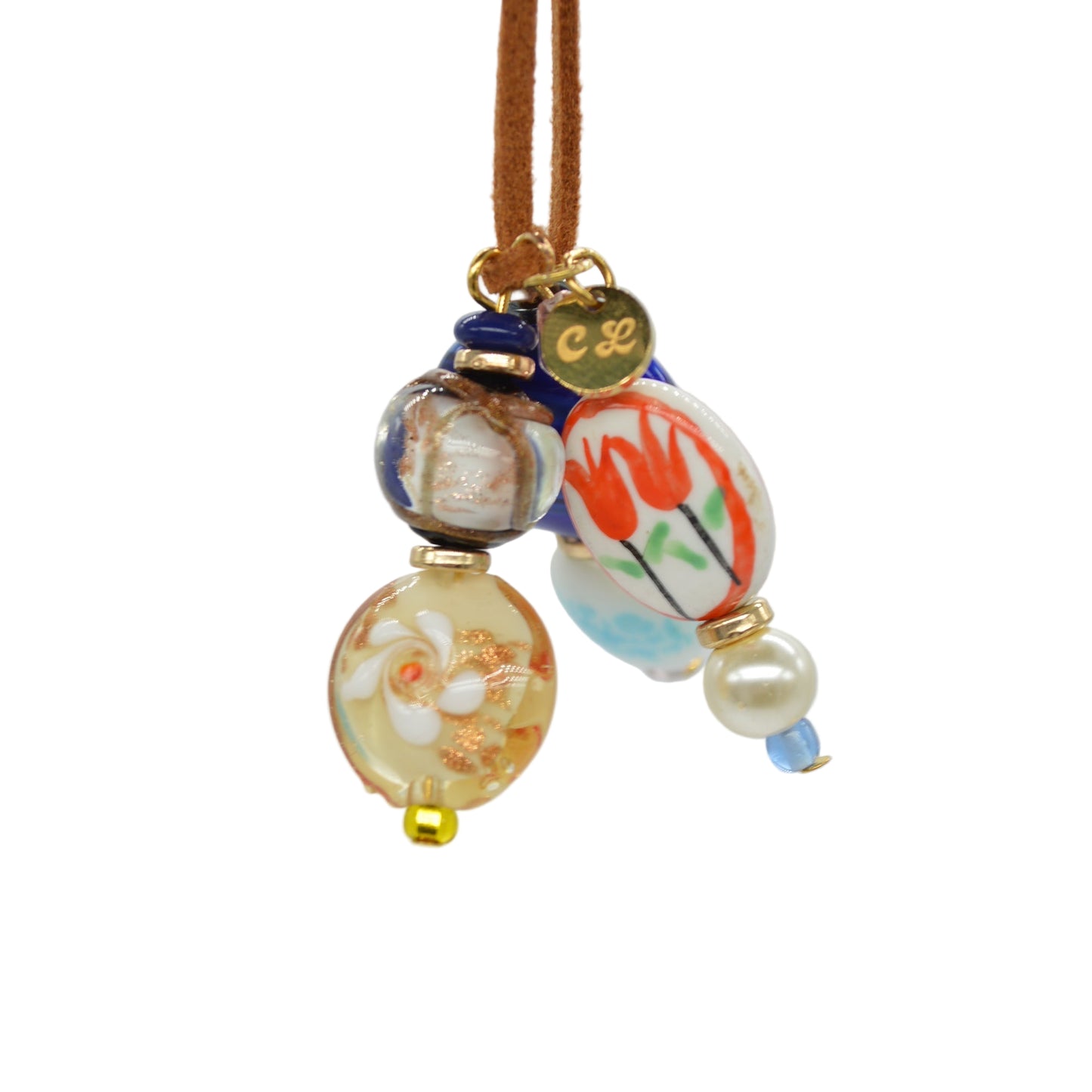 Decorative hair tie with colorful beads on a light gray background