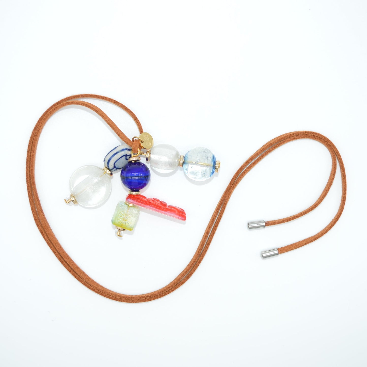 Glasses with a brown cord on a white background