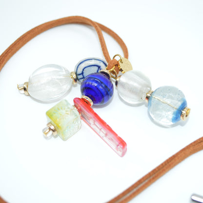 Necklace with colorful beads on a white background