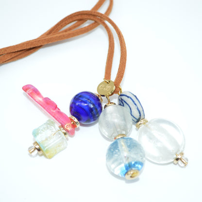 Necklace with colorful beads on a white background