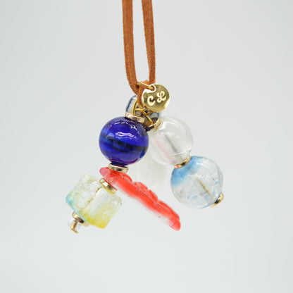 Necklace with colorful beads on a white background