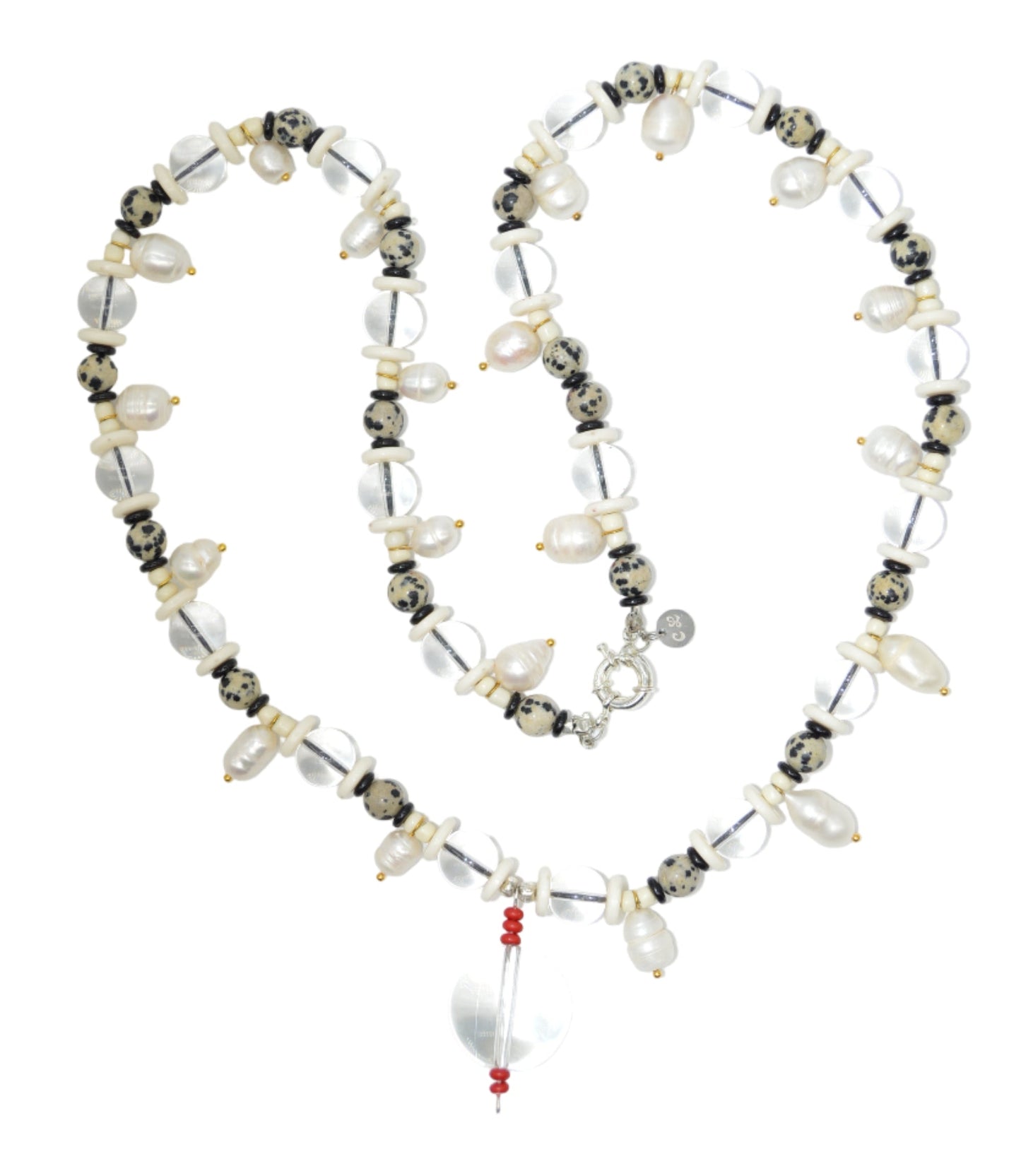 Necklace with various beads on a white background