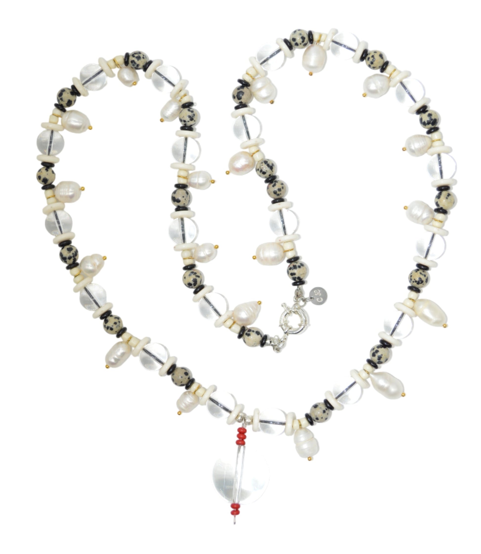 Necklace with various beads on a white background