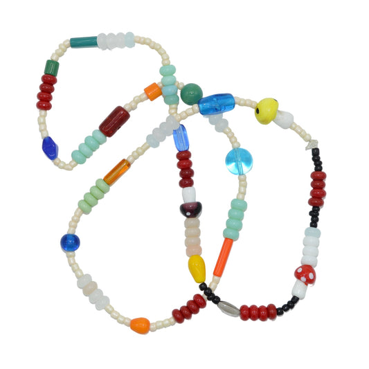 Colorful beaded necklaces on a white background