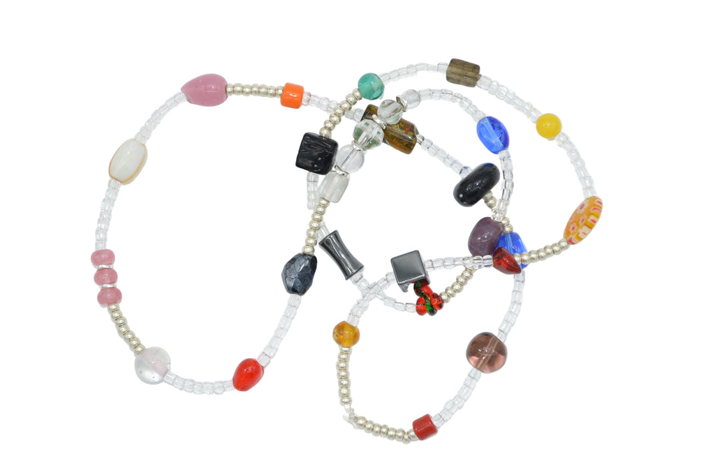Necklace with multicolored beads on a white background