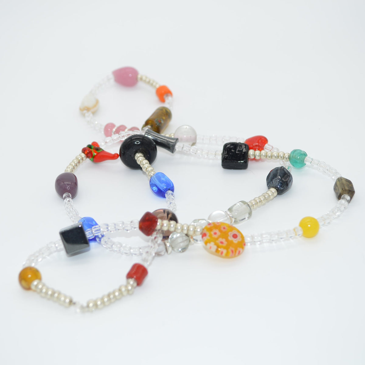 Colorful beaded bracelet on a white background