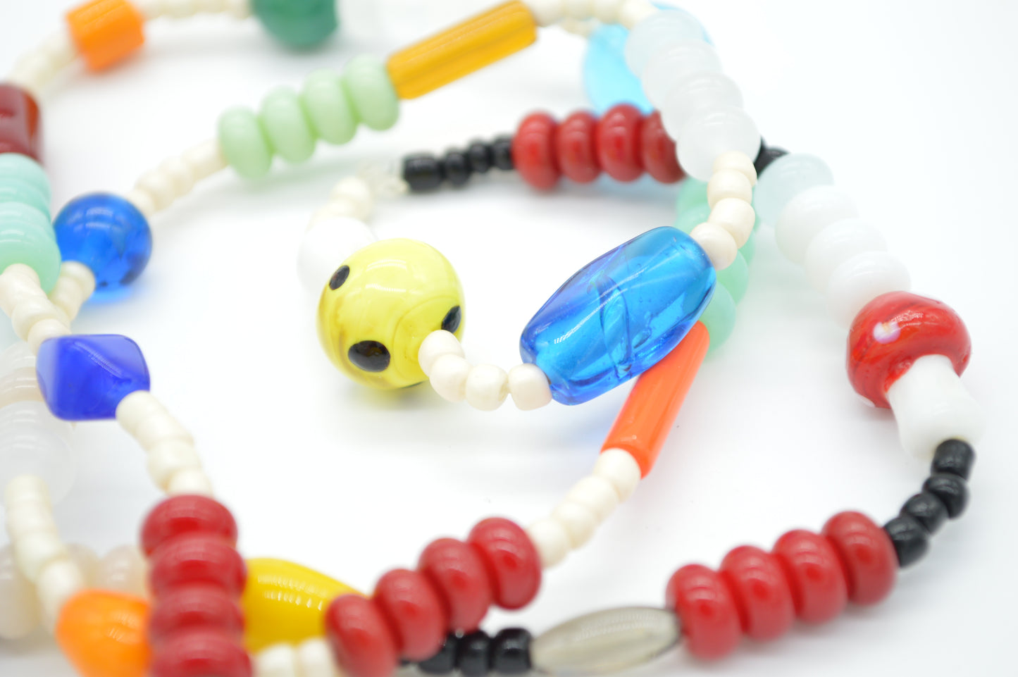 Colorful beaded bracelet on a white background