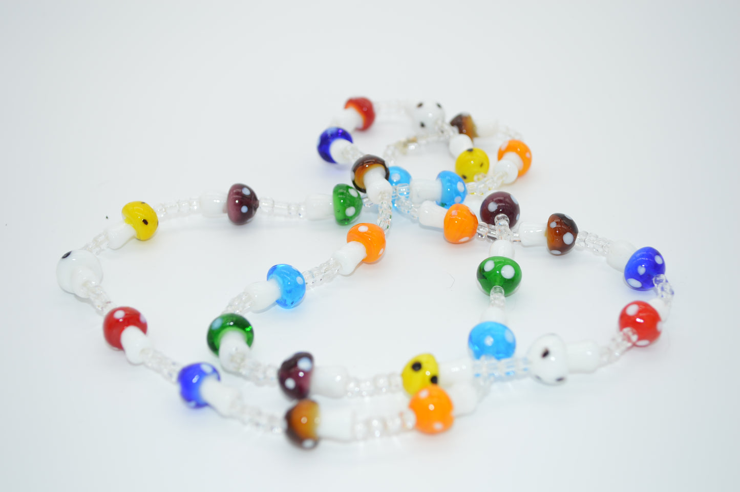 Colorful beaded necklace on a white background