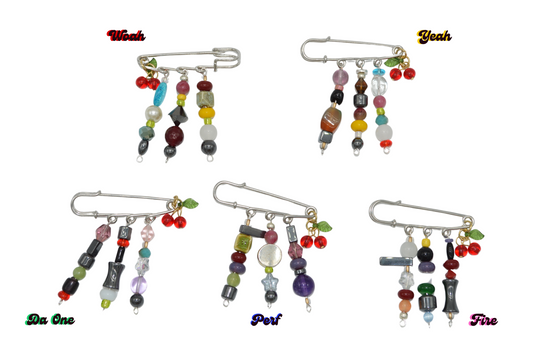 Set of colorful beaded brooches with labels on a white background