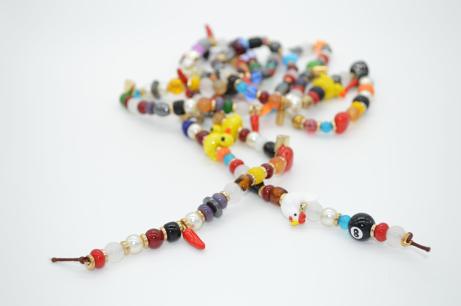 Colorful beaded necklace on a white background