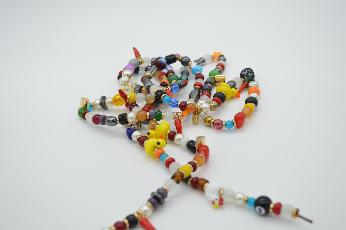 Colorful beaded necklace on a white background