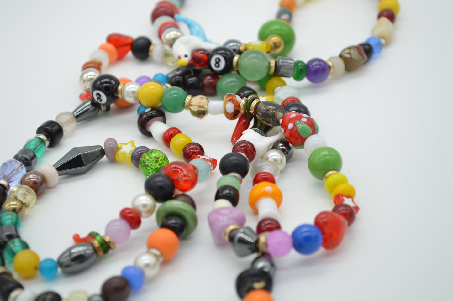 Colorful beaded necklace on a white background