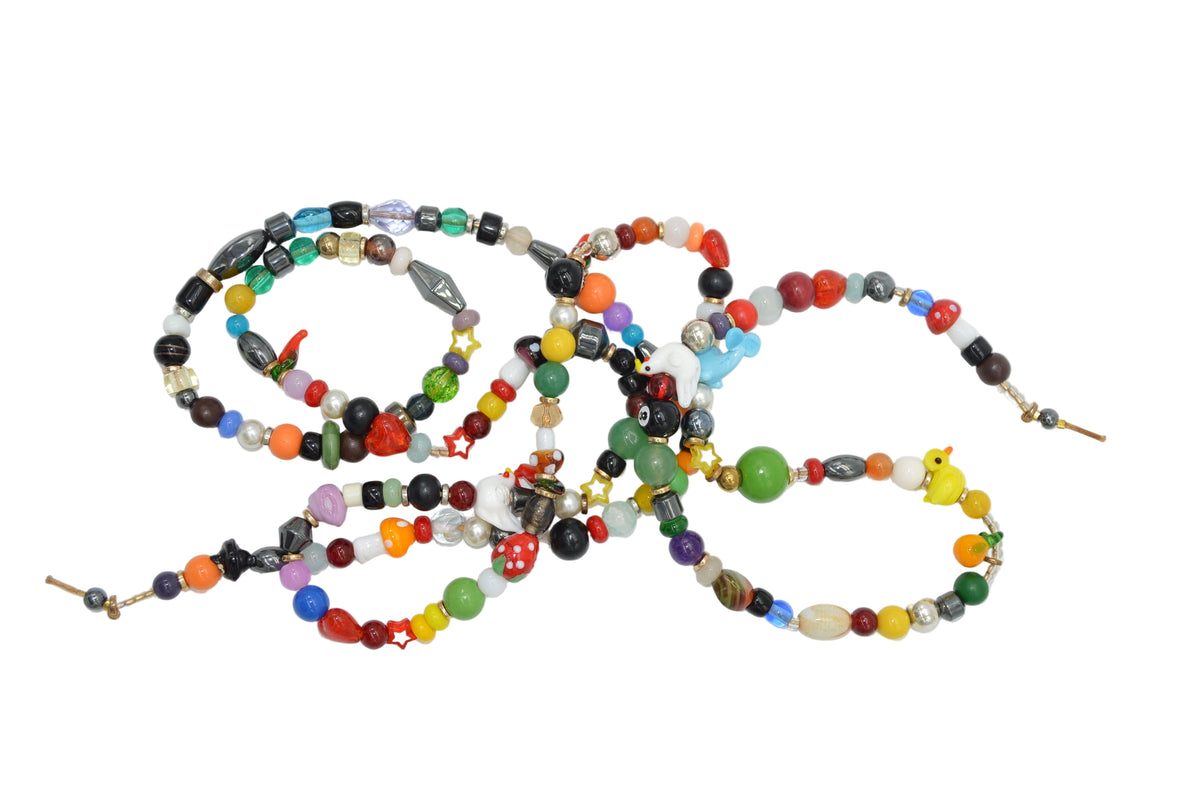 Colorful beaded necklace on a white background