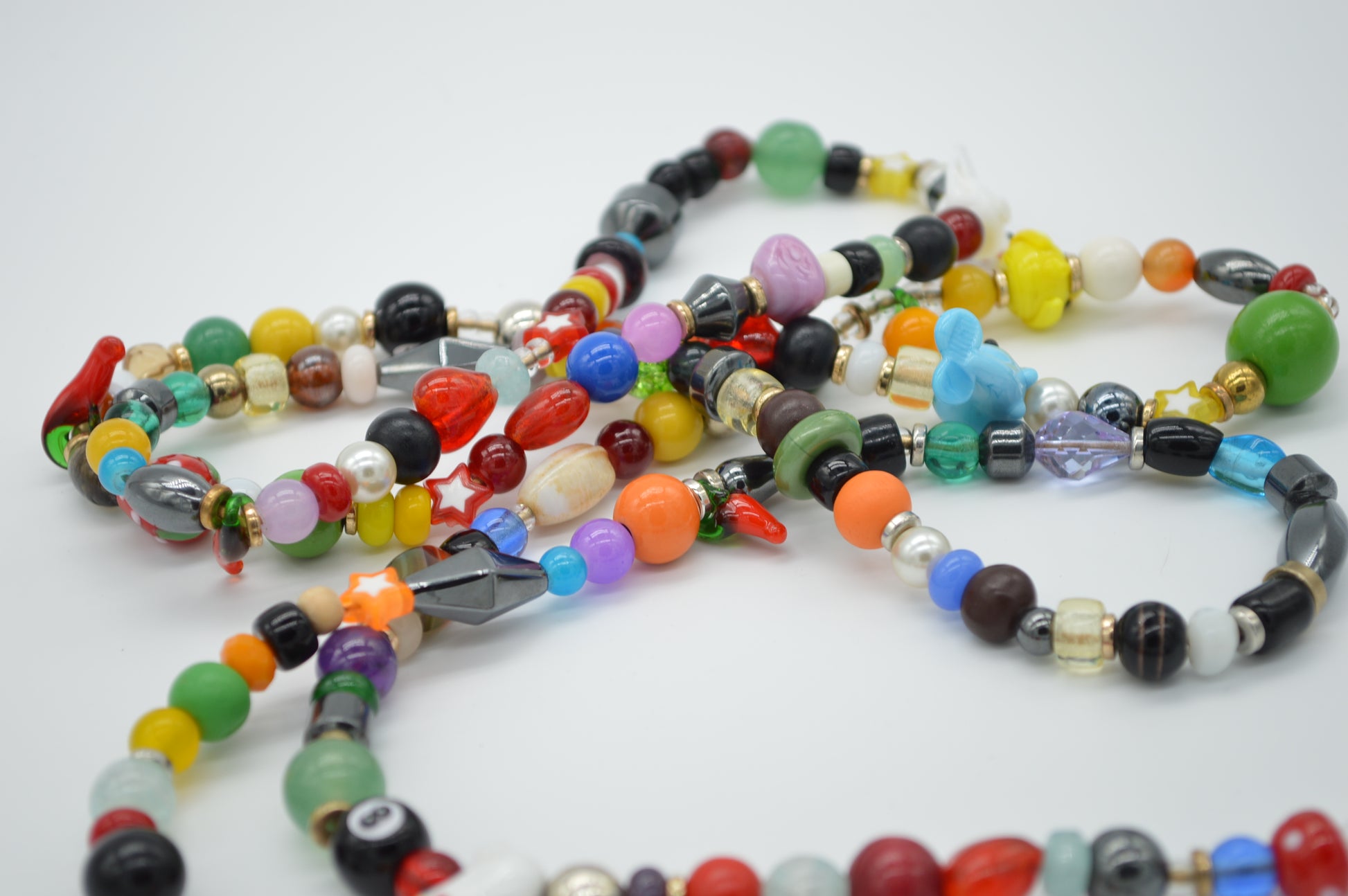 Colorful beaded necklace on a white background