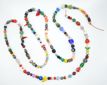 Colorful beaded necklace on a white background