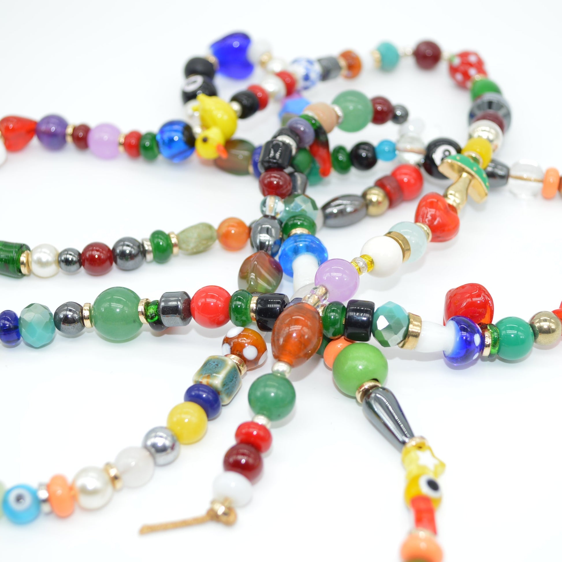 Colorful beaded necklace on a white background