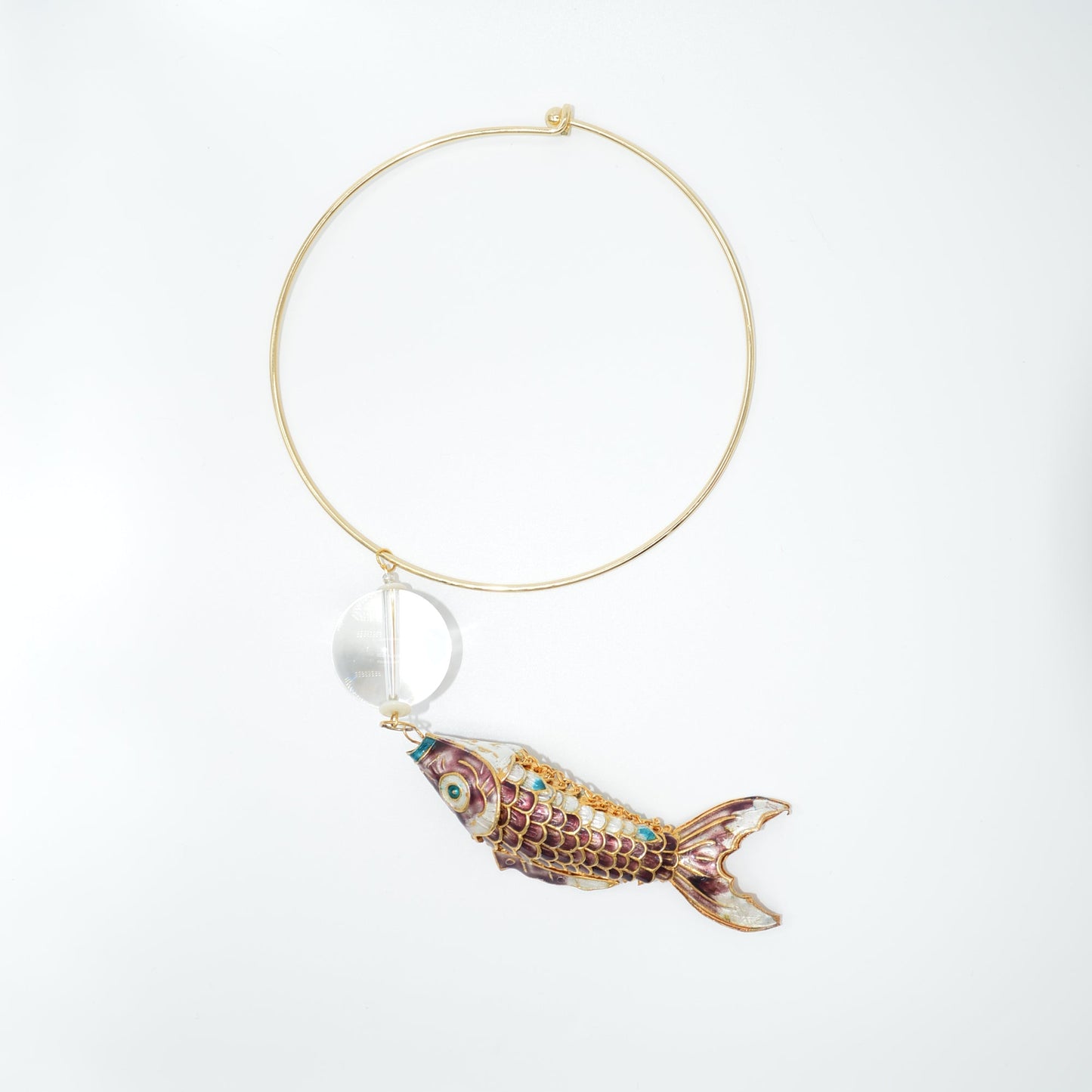 Fishing lure shaped like a fish on a white background