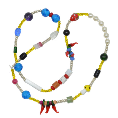 Colorful beaded necklace on a white background