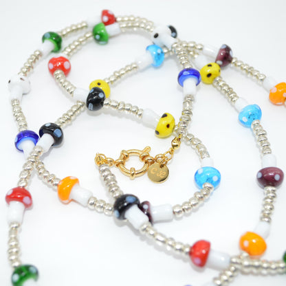 Colorful beaded necklace with a gold clasp on a white background