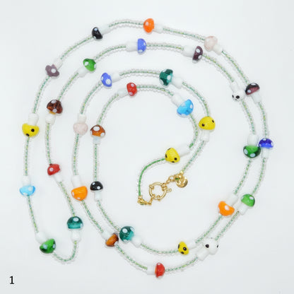 Colorful beaded necklace on a white background
