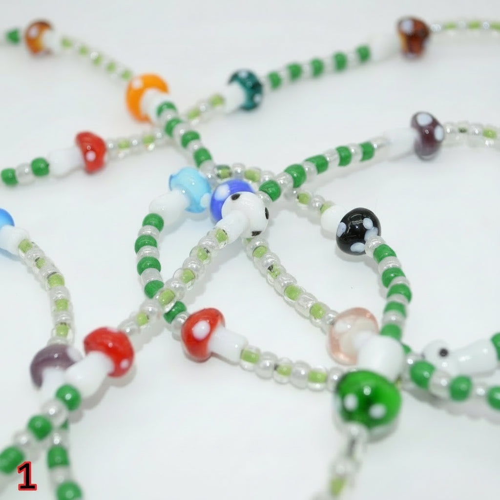 Colorful beaded necklaces on a white background