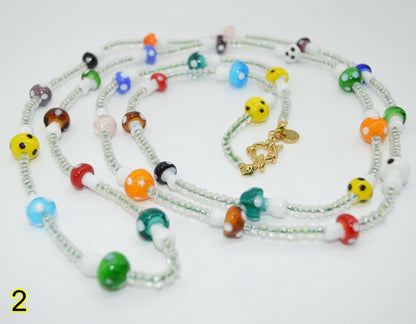 Colorful beaded necklace on a white background