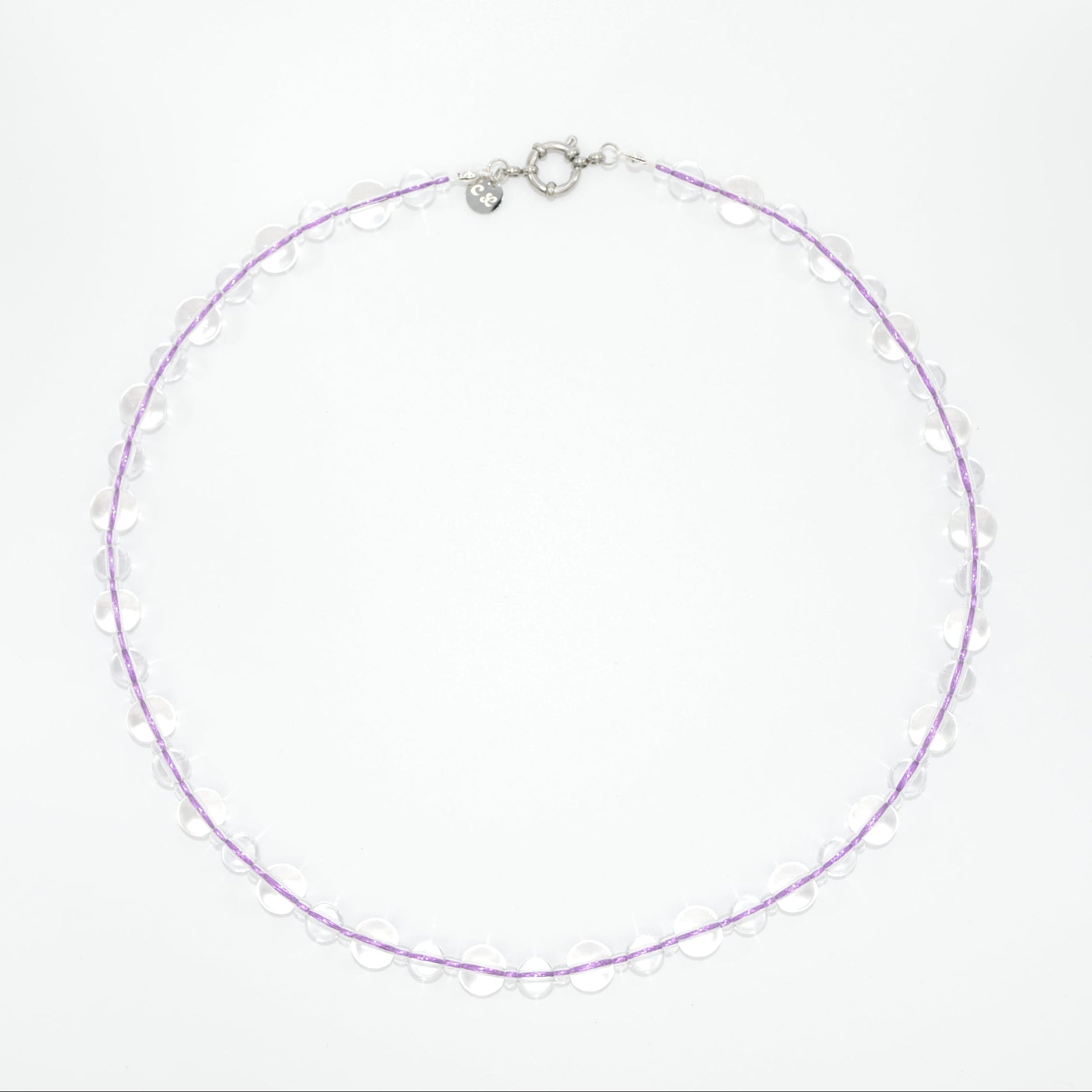 glass necklace with purple lace on a white background