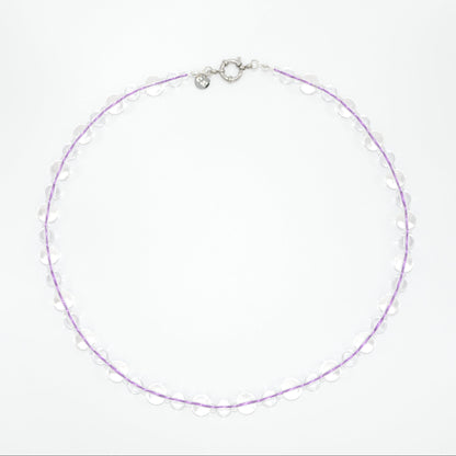 glass necklace with purple lace on a white background
