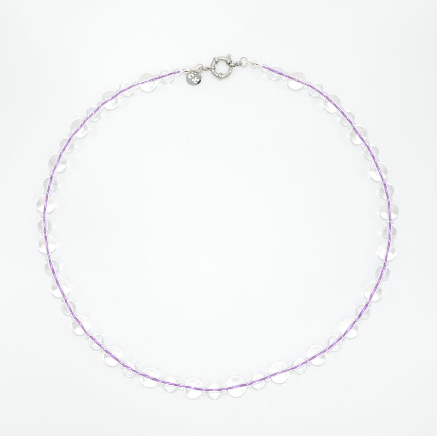 glass necklace with purple lace on a white background