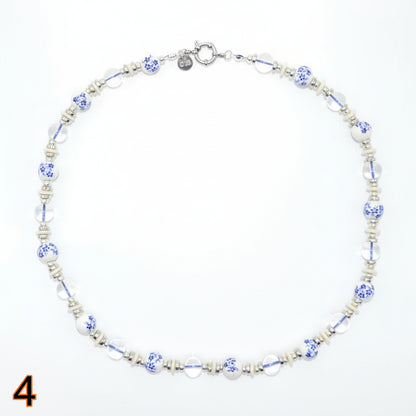 Necklace with small beads on a white background