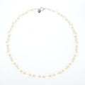 Gold necklace on a white background