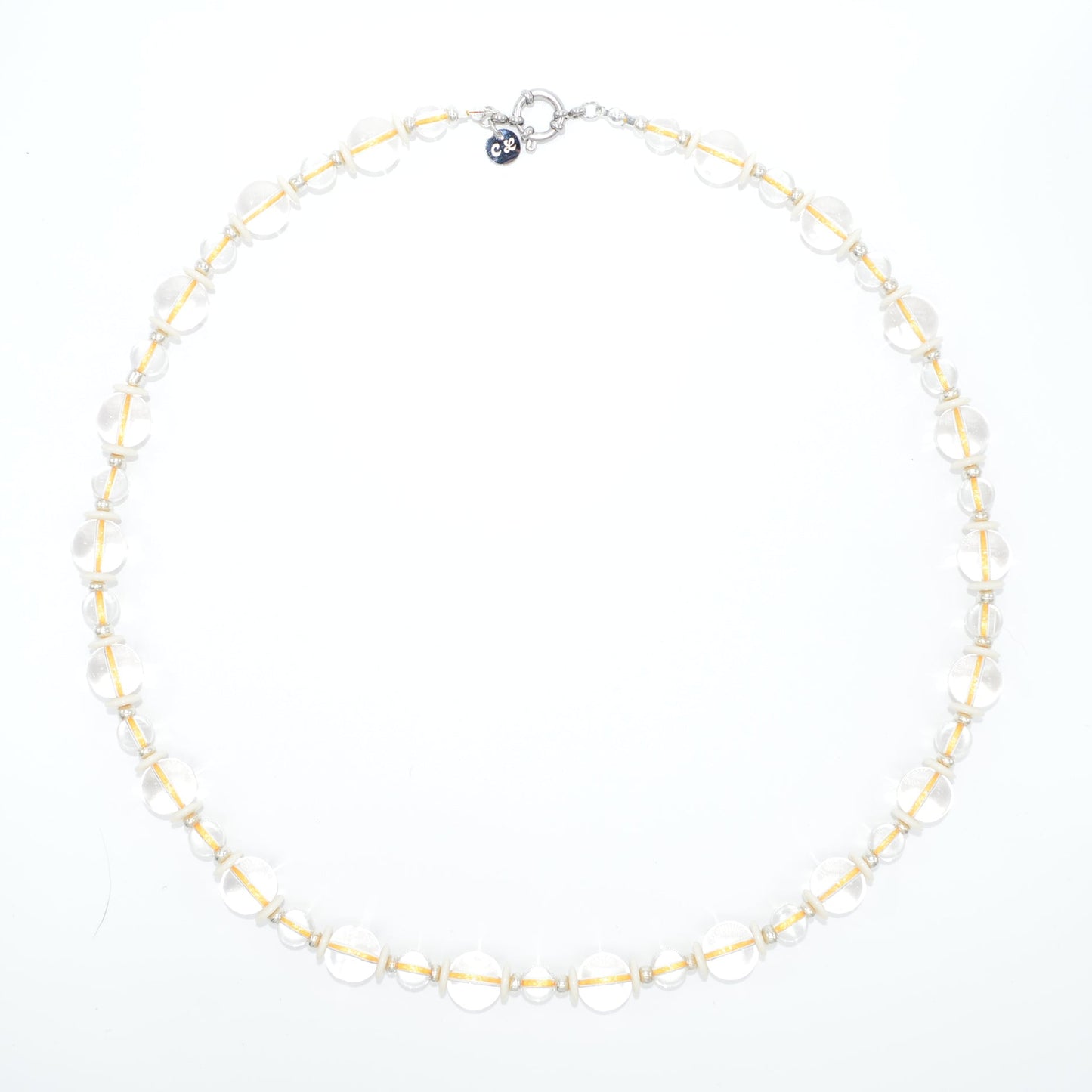 Gold necklace on a white background
