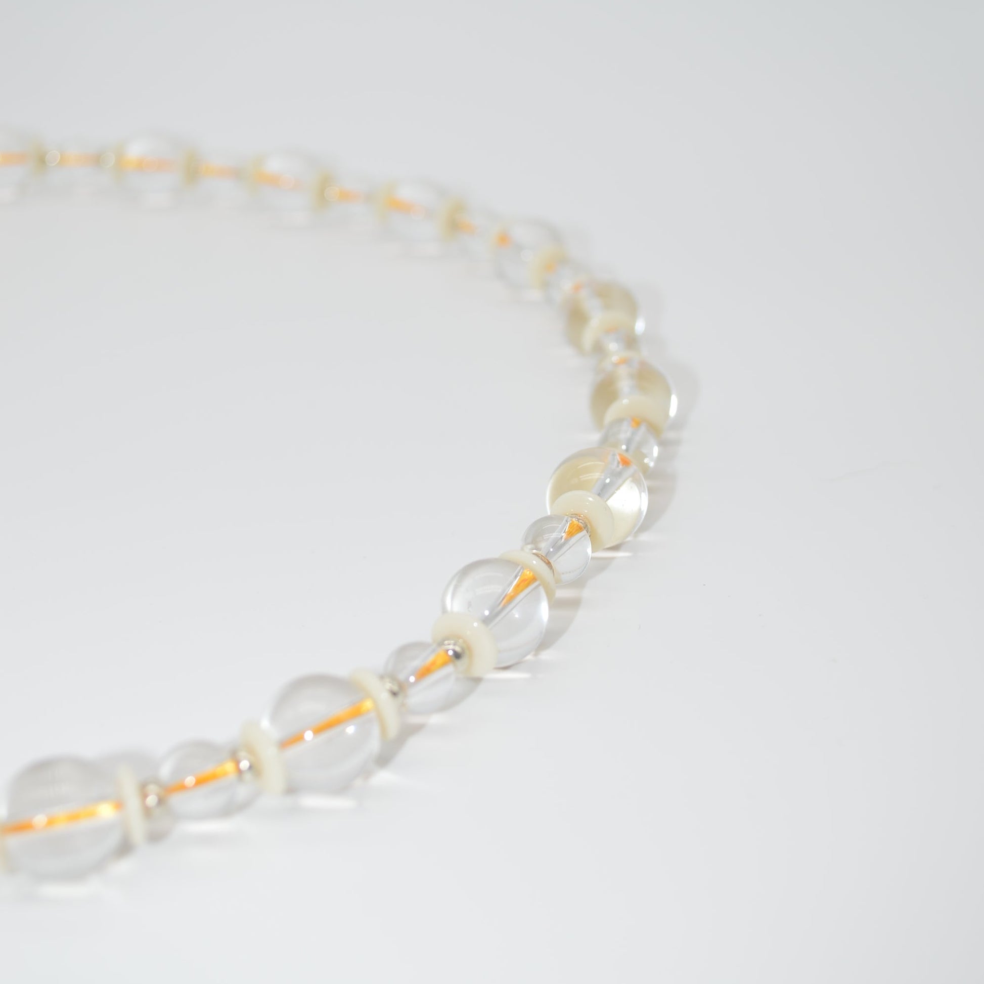 Pearl necklace on a white background