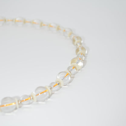 Pearl necklace on a white background