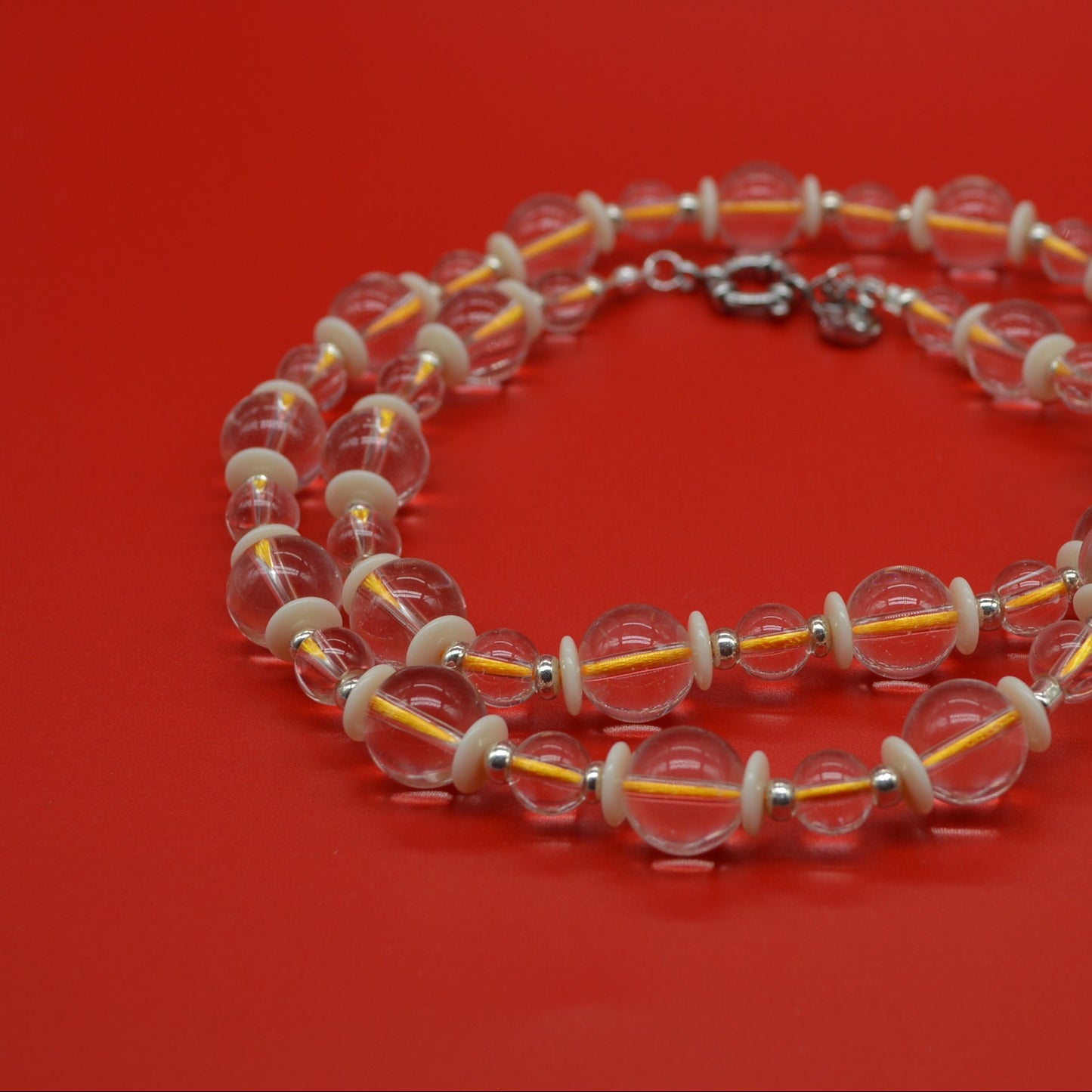 Beaded bracelet on a red background