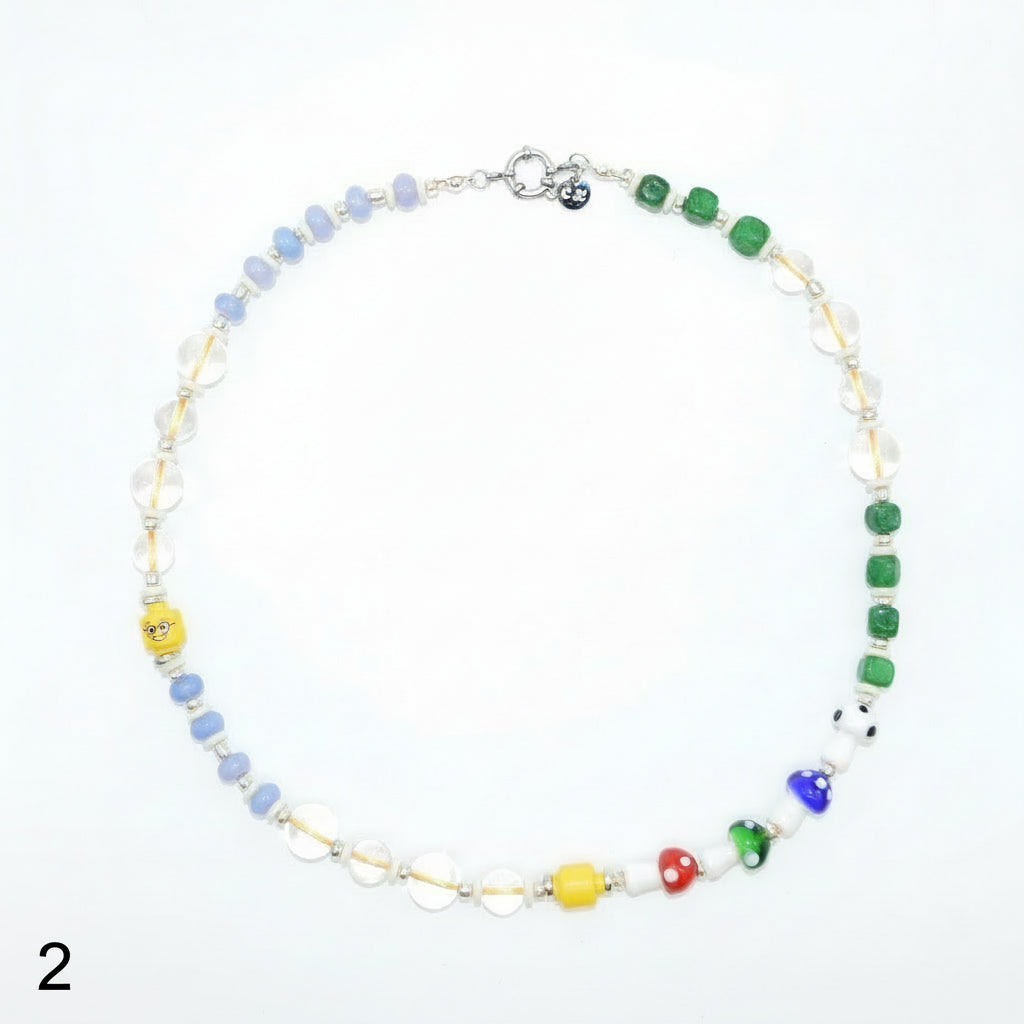 Necklace with colorful beads on a white background