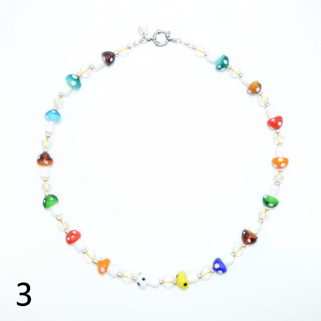 Necklace with colorful heart-shaped beads on a white background