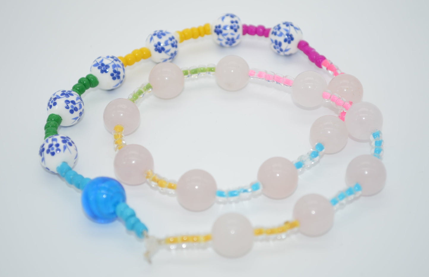 Colorful beaded necklace on a white background