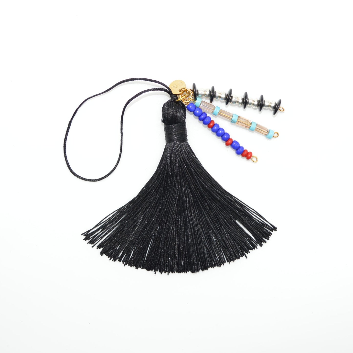 Black tassel with colorful beads on a white background