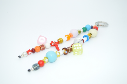 Colorful beaded keychain on a white background